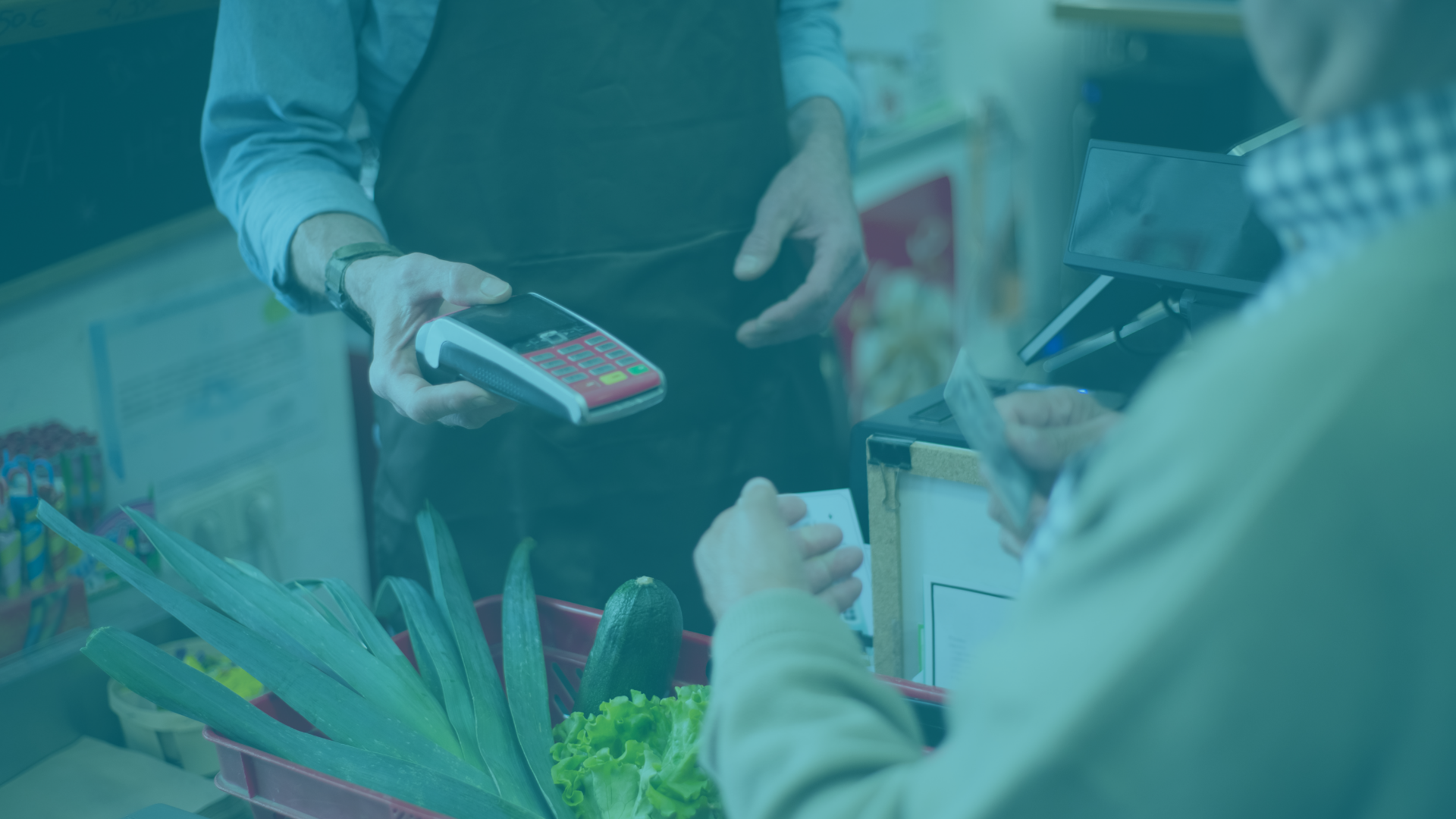 Money is exchanged at a grocery store